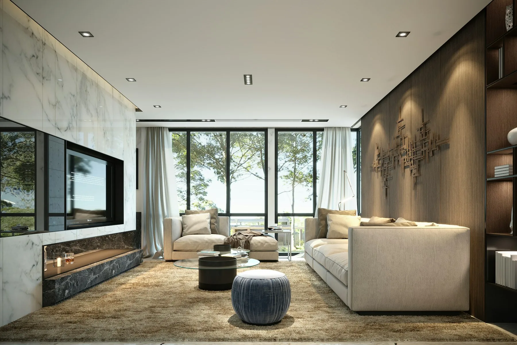 A living room with full-height glass looking out over the trees